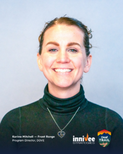 Smiling headshot of a person with hair pulled back, wearing a black turtleneck and heart-shaped pendant necklace against a light blue-gray background. Bottom text includes name and role; inniVee Strategies and Deaf TRAIL logos at bottom right.