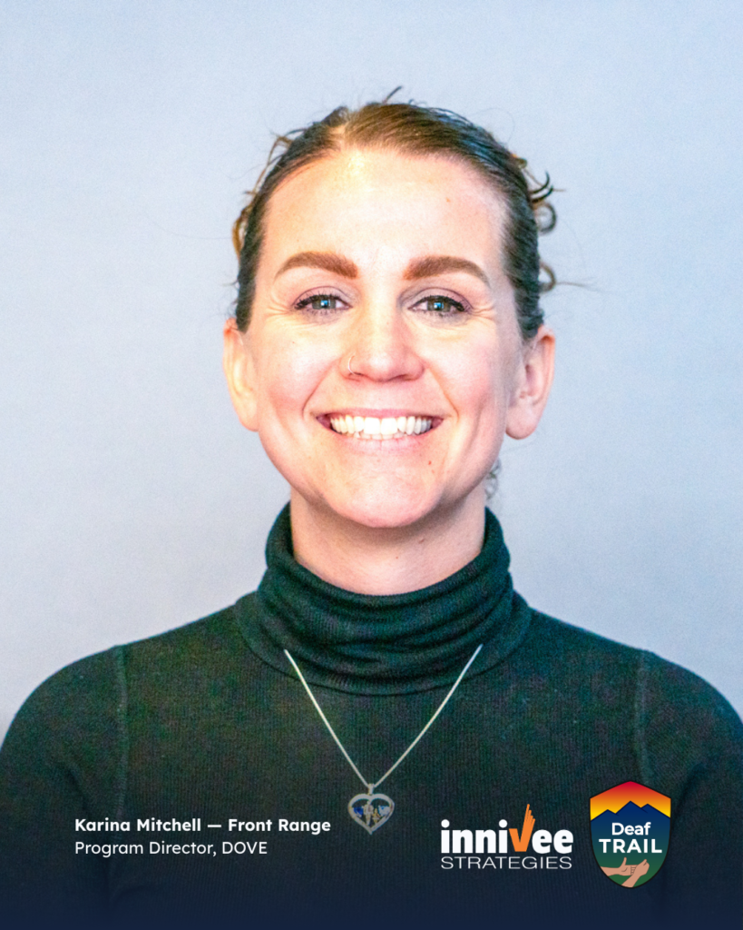 Deaf TRAIL Is Underway: Introducing Colorado’s First Cohort 6 Smiling headshot of a person with hair pulled back, wearing a black turtleneck and heart-shaped pendant necklace against a light blue-gray background. Bottom text includes name and role; inniVee Strategies and Deaf TRAIL logos at bottom right.