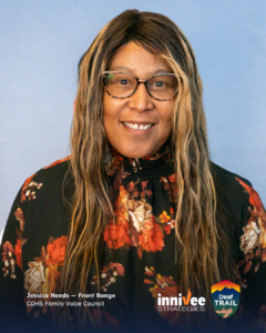 Smiling headshot of a person with long highlighted hair and patterned glasses, wearing a dark floral top against a light blue-gray background. Bottom-left text shows name and affiliation; inniVee Strategies and Deaf TRAIL logos at bottom right.